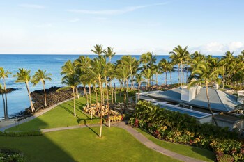 Hypo-allergenic bedding, in-room safe, desk, laptop workspace at Fairmont Orchid