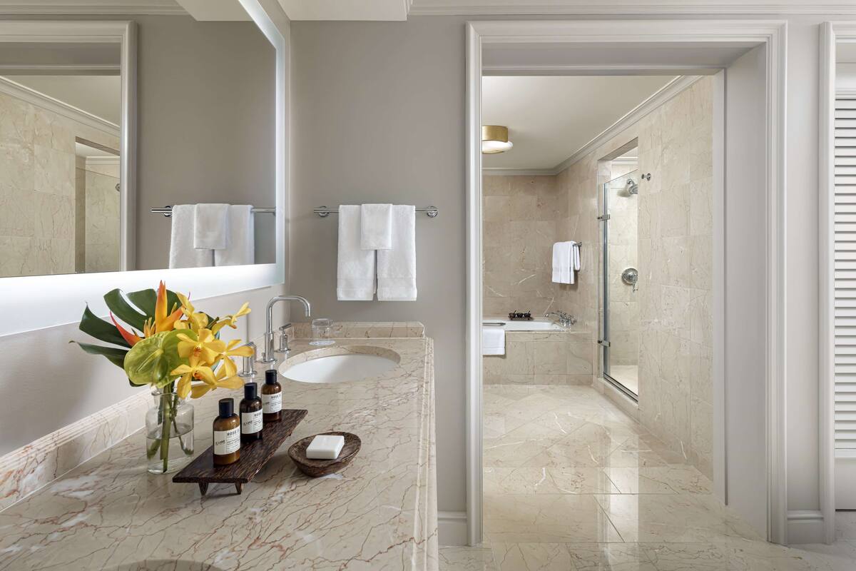 separate bathtub and shower, designer toiletries, hair dryer, bathrobes