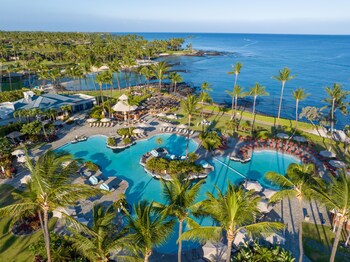 Outdoor pool, cabanas (surcharge), pool umbrellas at Fairmont Orchid