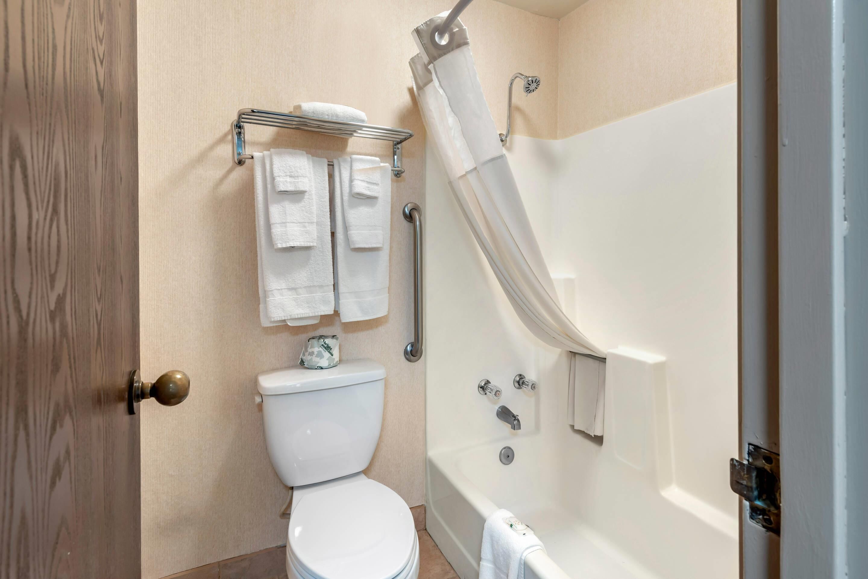 desk, laptop workspace, blackout curtains, iron/ironing board