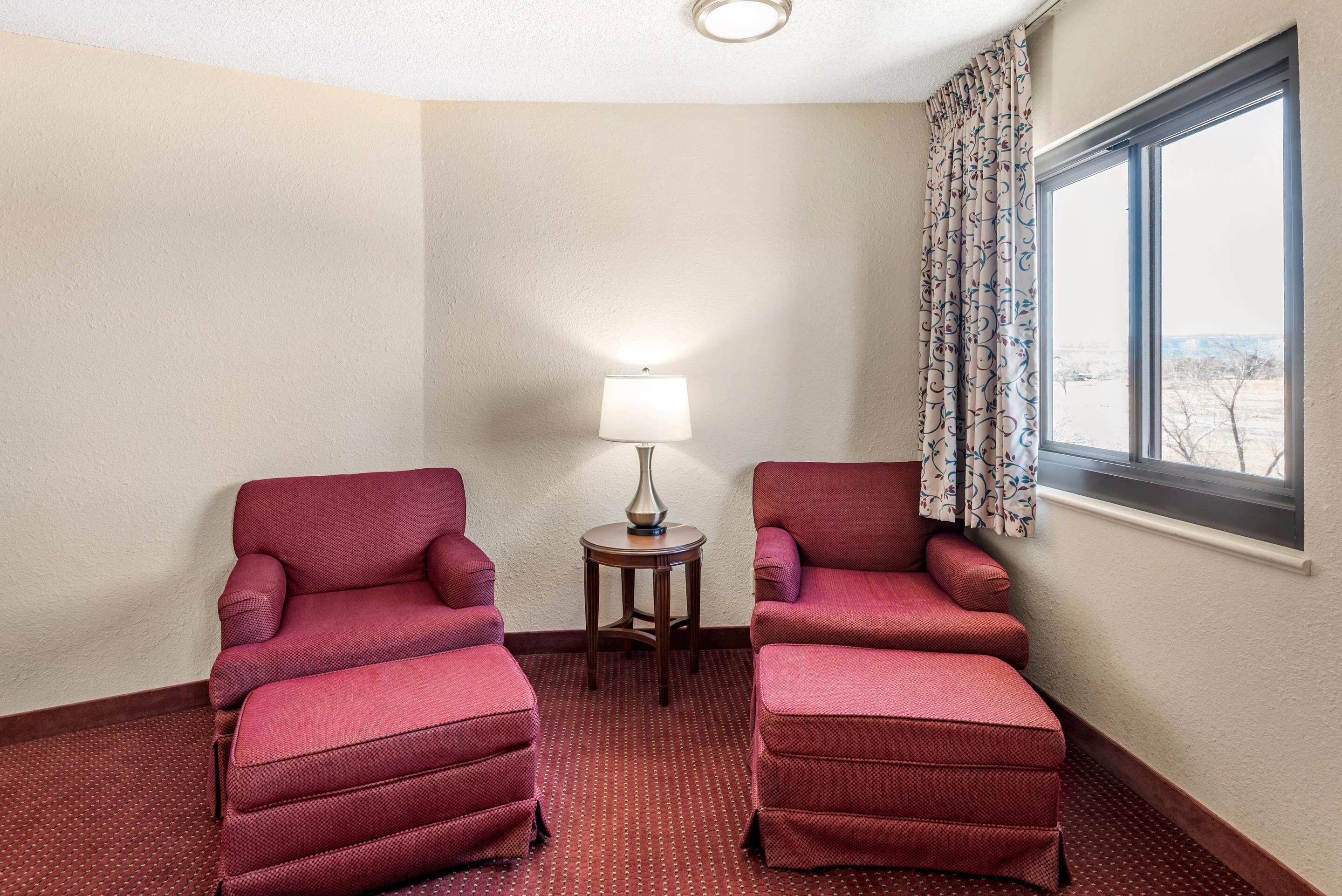 desk, laptop workspace, blackout curtains, iron/ironing board