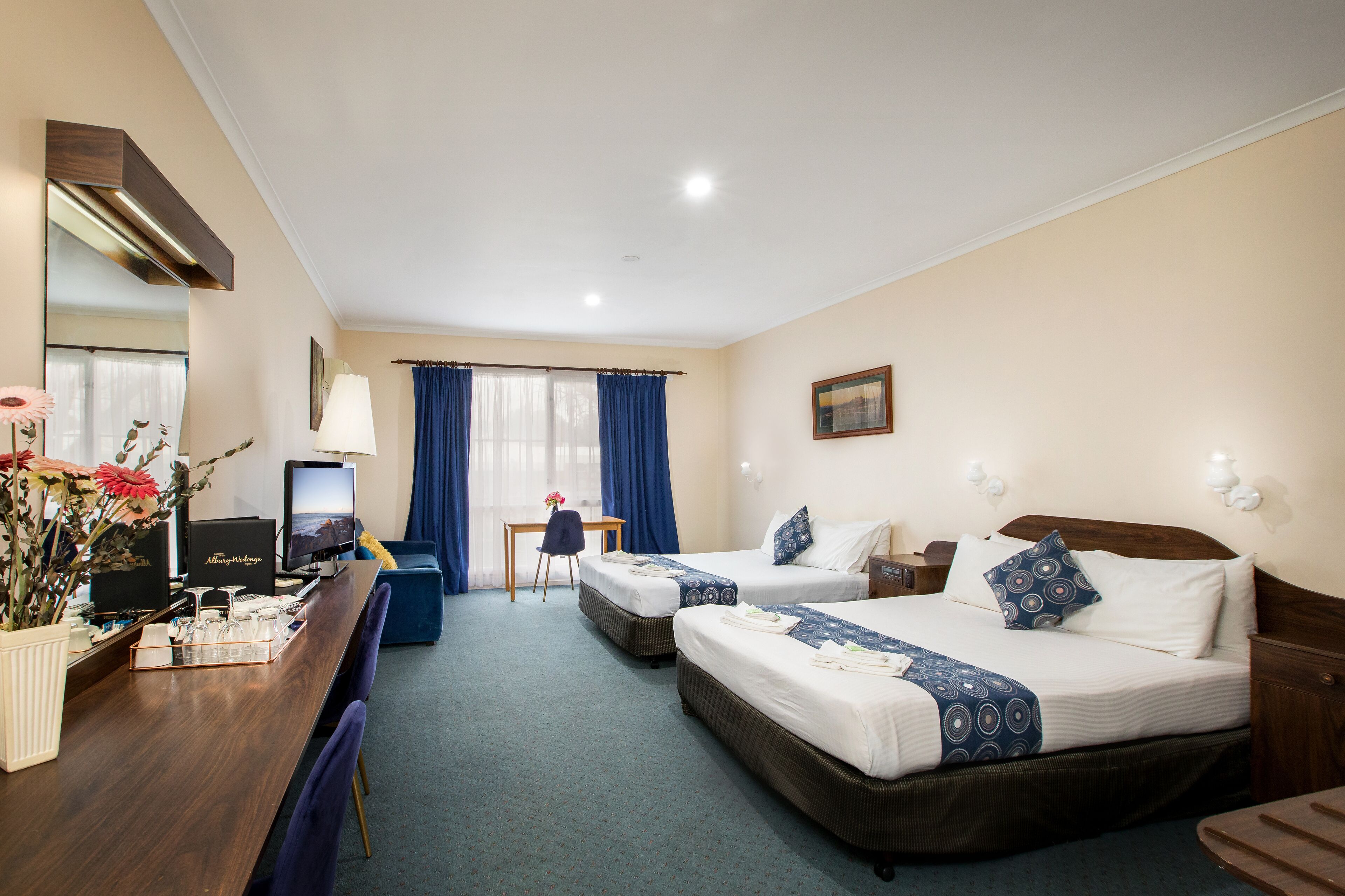 Family Room, 2 Queen Beds, Refrigerator & Microwave, Garden View | Soundproofing, iron/ironing board, free WiFi, bed sheets