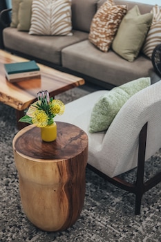 Sitting area in hotel lobby at Ala Moana Hotel by Mantra