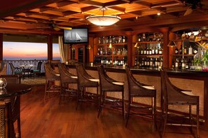 2 bars/lounges, poolside bar, beach bar