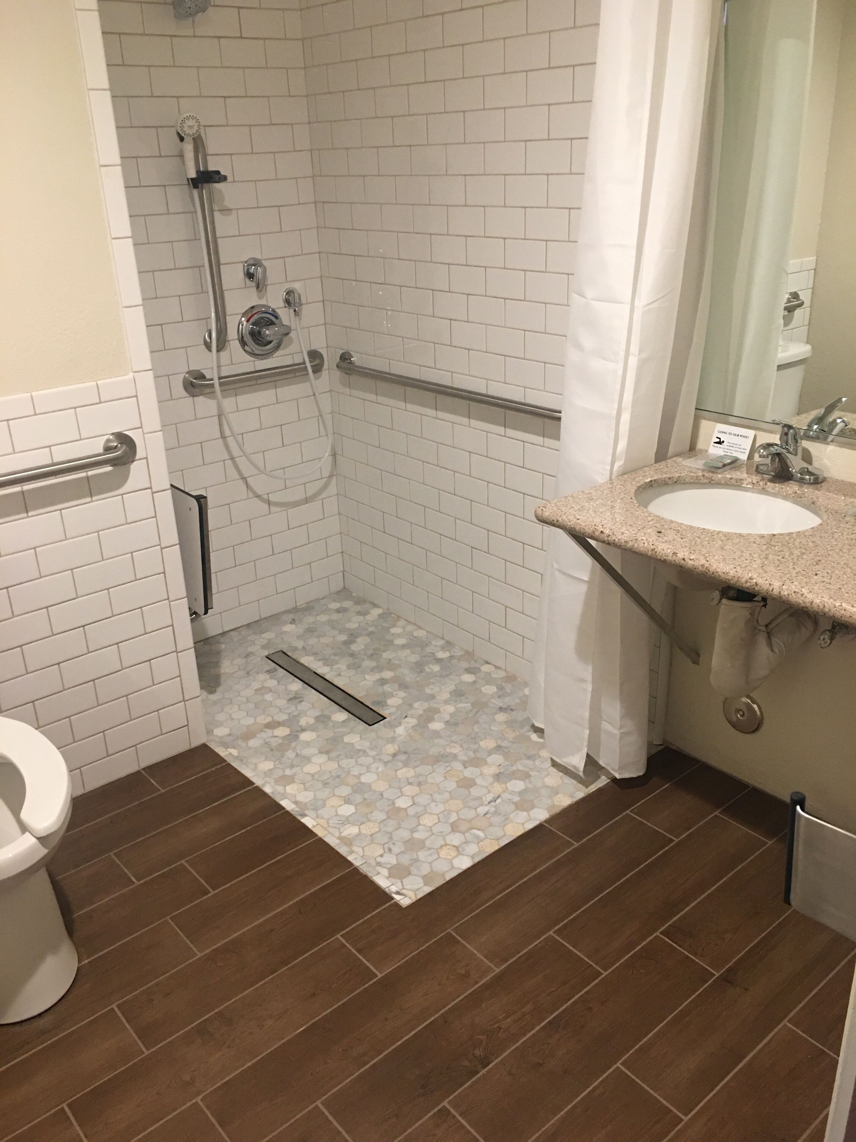 hydromassage showerhead, free toiletries, hair dryer, towels