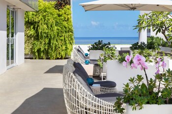 In-room safe, desk, laptop workspace, blackout drapes at AC Hotel by Marriott San Juan Condado