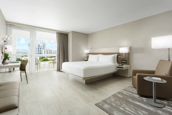 Room, 1 King Bed, Balcony | In-room safe, desk, laptop workspace, blackout drapes at AC Hotel by Marriott San Juan Condado