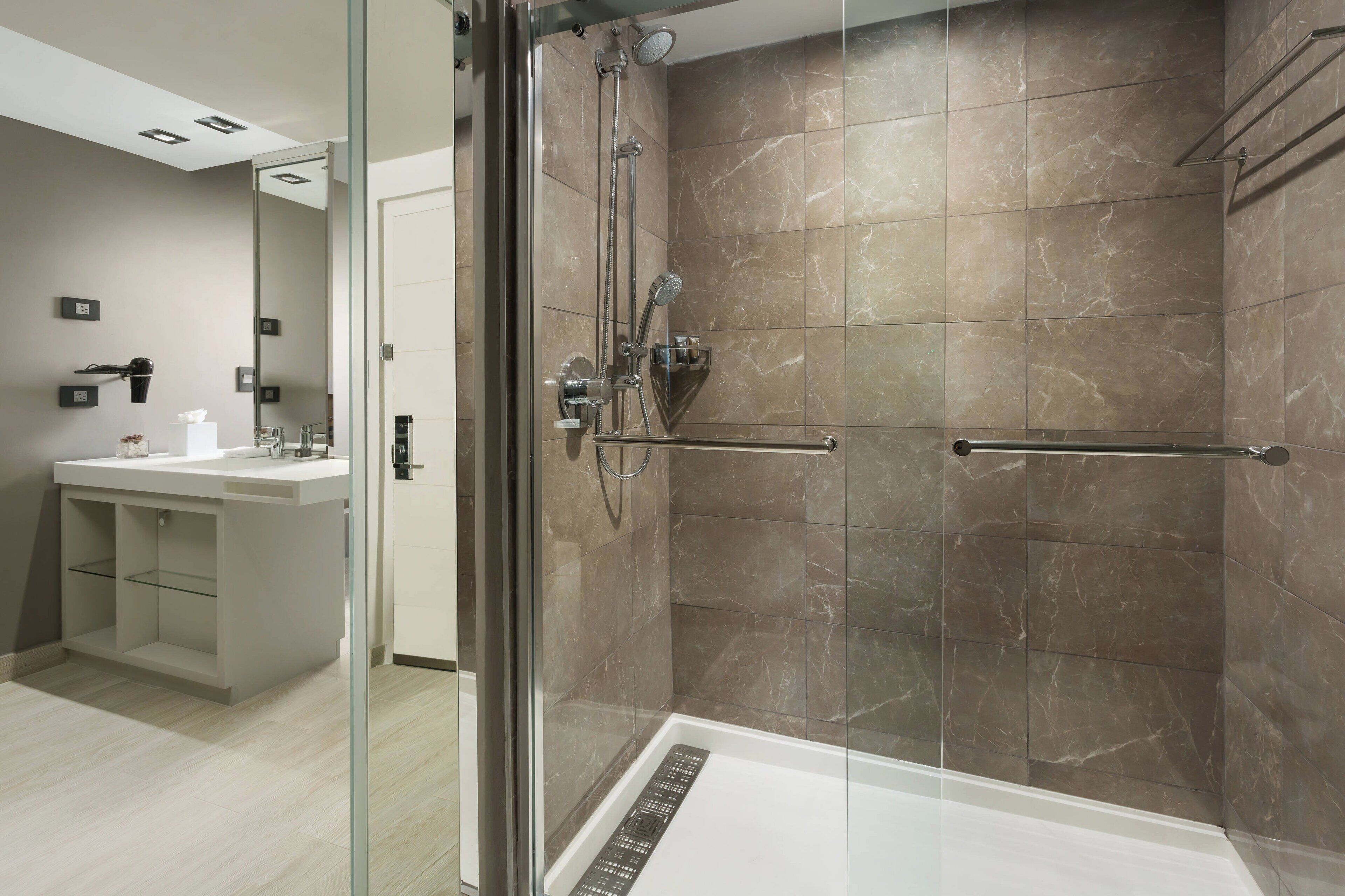 Eco-friendly toiletries, hair dryer, bathrobes, towels