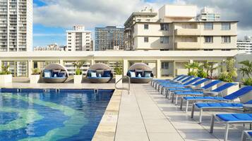 Outdoor pool, open 7:00 AM to 10:00 PM, cabanas (surcharge)
