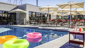 Outdoor pool, open 9:00 AM to 8:00 PM, pool loungers