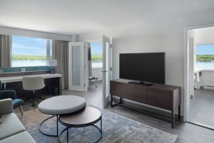 Junior Suite, 1 King Bed with Sofa bed, River View | Living area | 55-inch LED TV with cable channels, TV, Netflix