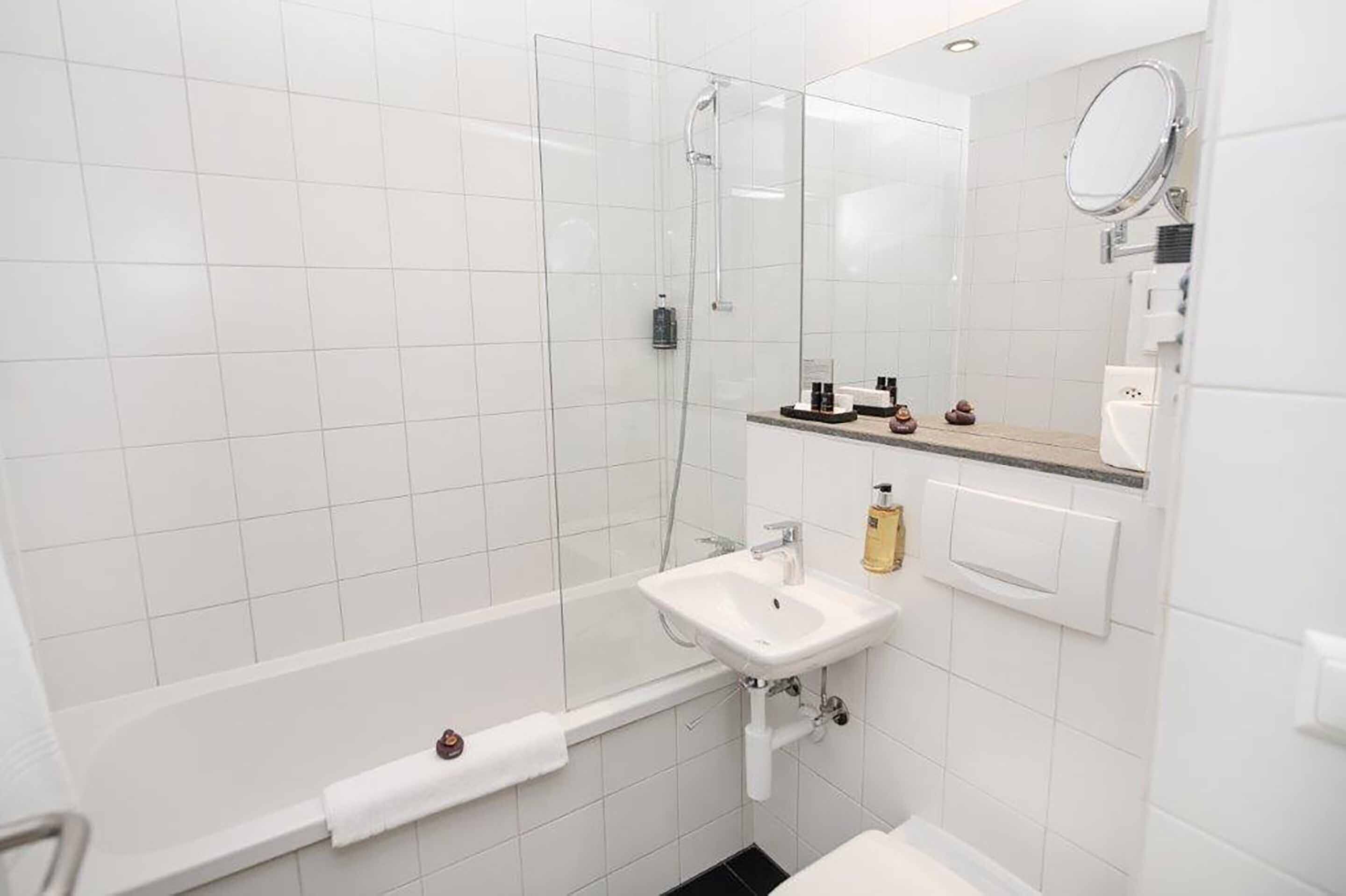 eco-friendly toiletries, hair dryer, towels