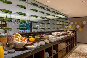 Daily buffet breakfast (USD 22 per person)