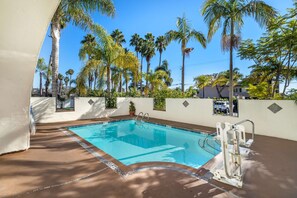 Outdoor pool, open 8:00 AM to 10:00 PM, sun loungers