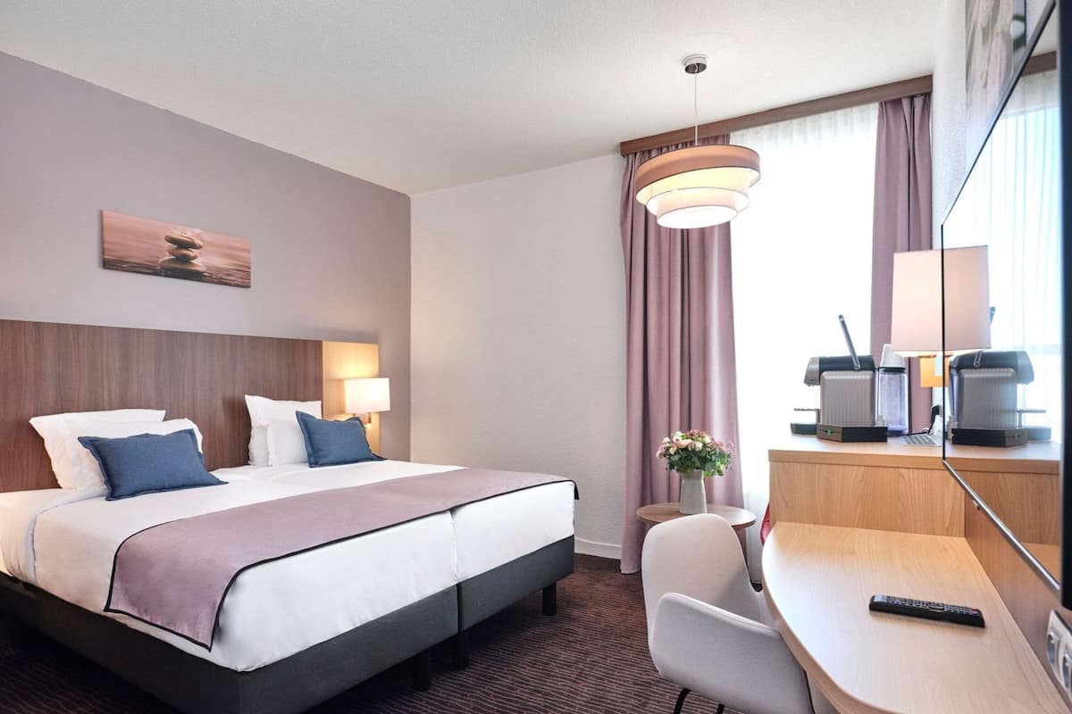 Ropa de cama de alta calidad, camas Select Comfort y minibar