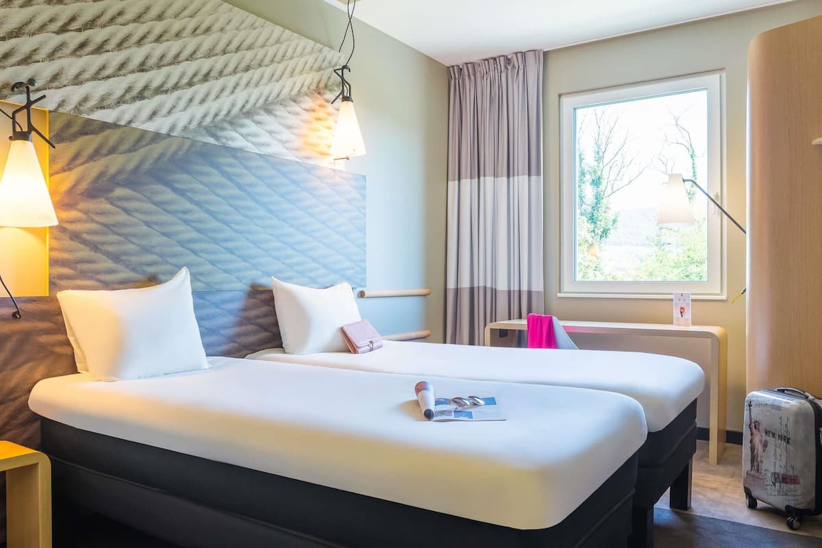 Premium bedding, desk, blackout curtains, soundproofing