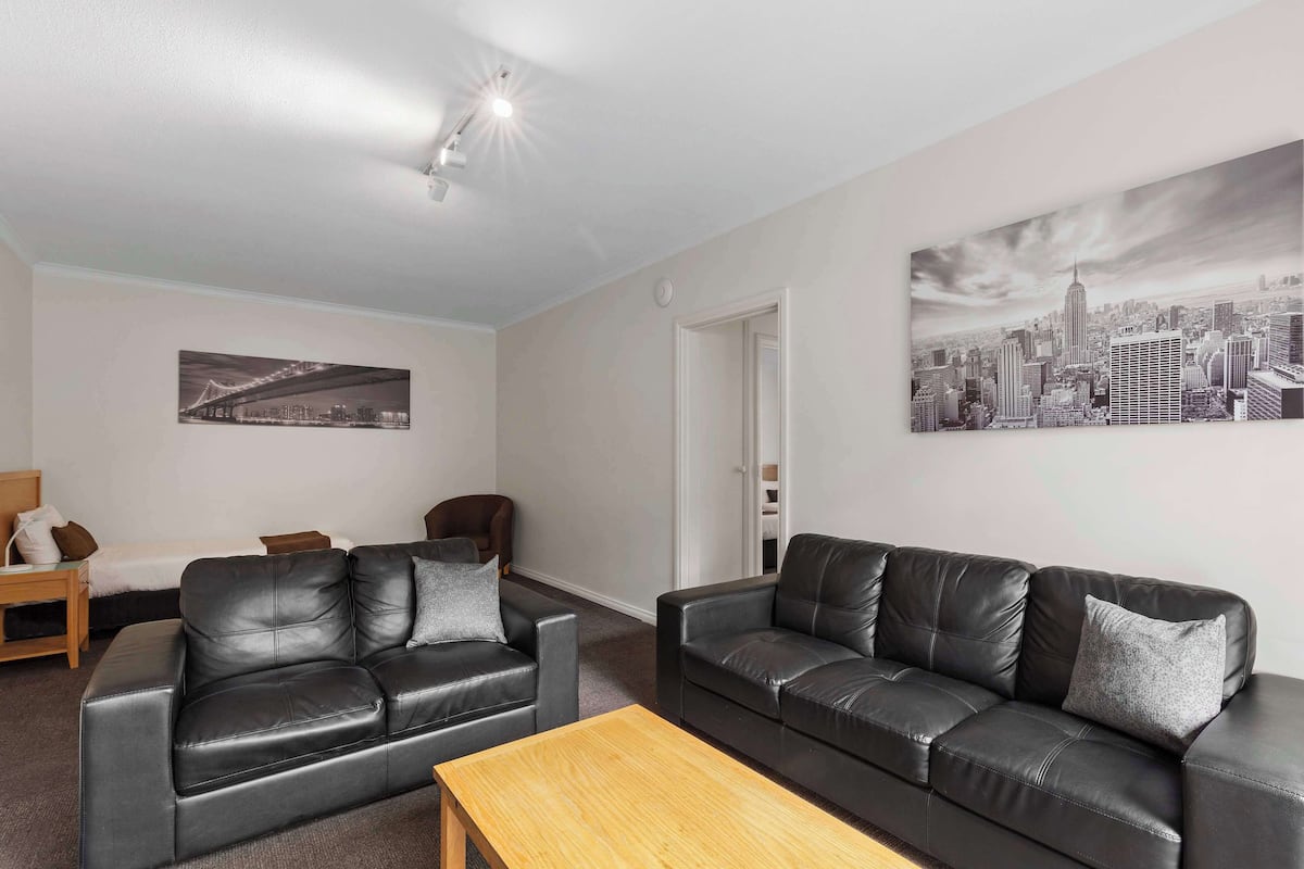 Standard Apartment, 2 Bedrooms, Non Smoking, Kitchen (Living Room) | Desk, blackout drapes, soundproofing, iron/ironing board