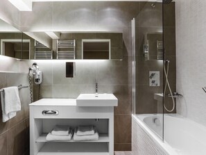 Premium bedding, free minibar items, in-room safe, desk