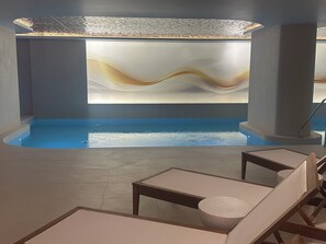 Indoor pool, open 7:00 AM to 8:00 PM, sun loungers