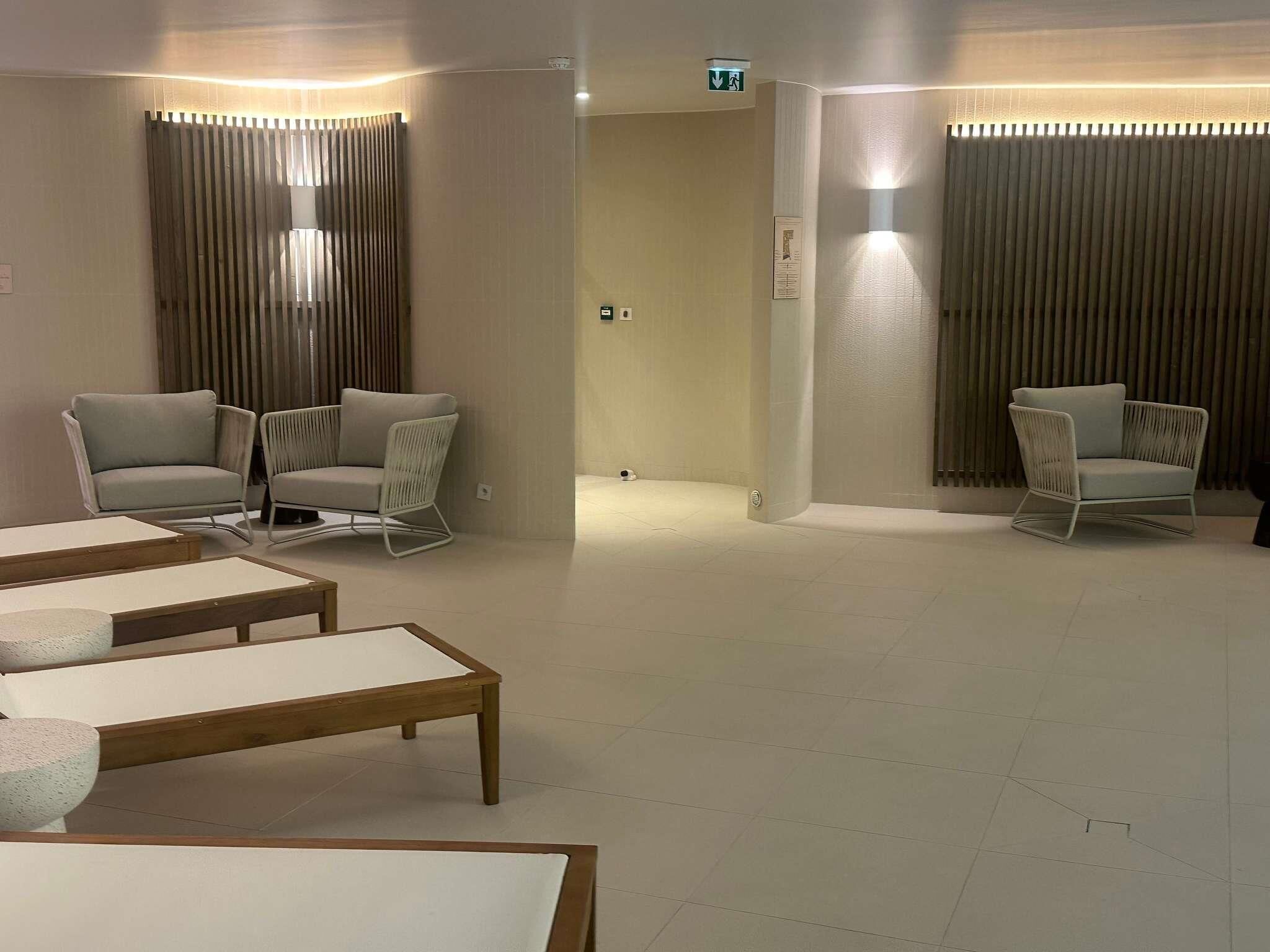 Indoor pool, open 7:00 AM to 8:00 PM, pool loungers