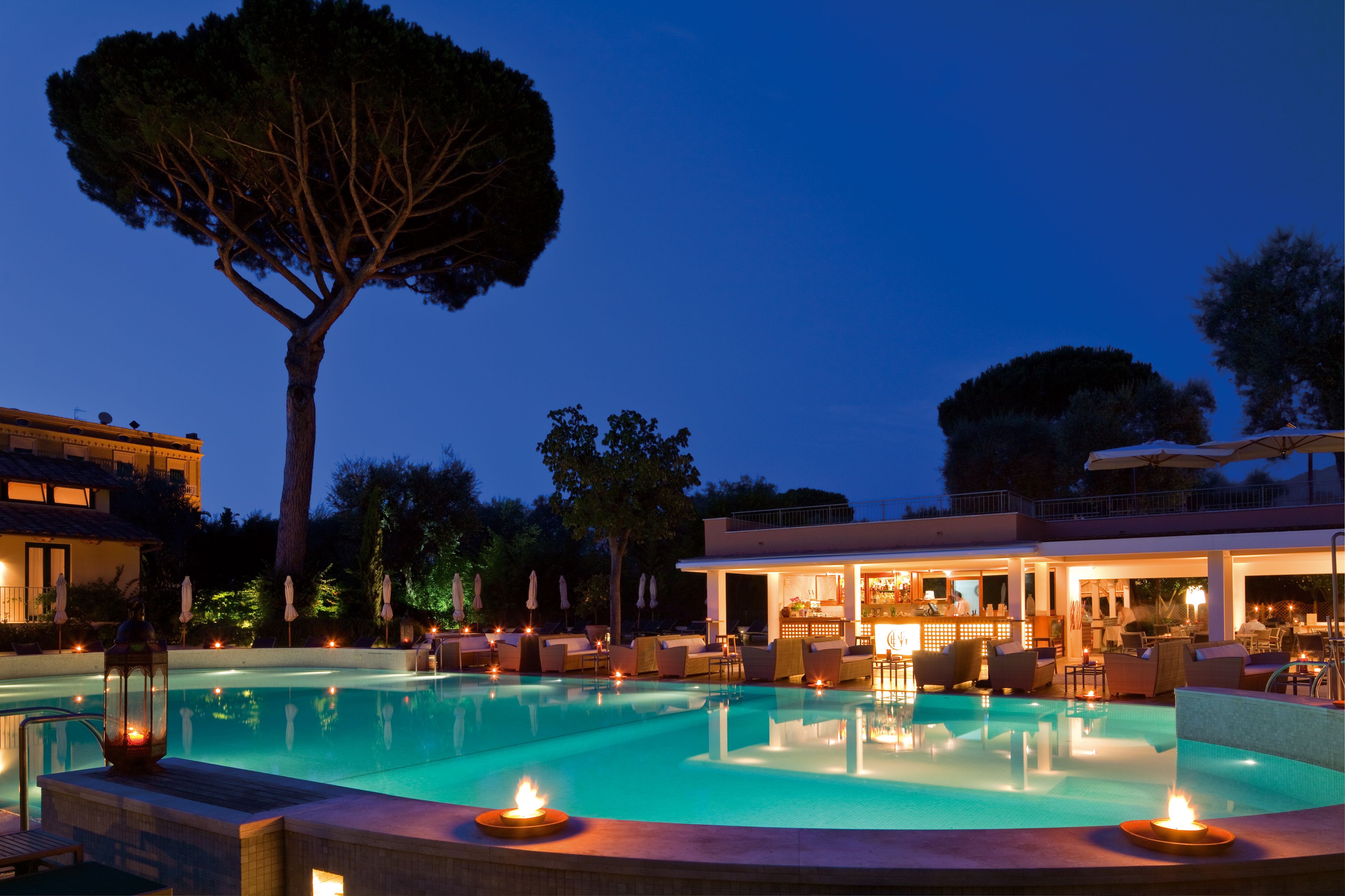 Seasonal outdoor pool, pool umbrellas, pool loungers