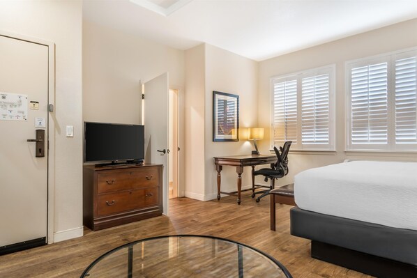 Room, 1 King Bed, Non Smoking, Jetted Tub (Larger Room) | Blackout drapes, iron/ironing board, cribs/infant beds, free WiFi
