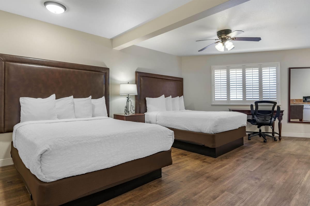 Suite, 2 Queen Beds, Non Smoking, Kitchen (with Sofabed, Full Kitchen) | Blackout drapes, iron/ironing board, cribs (surcharge), WiFi (free)
