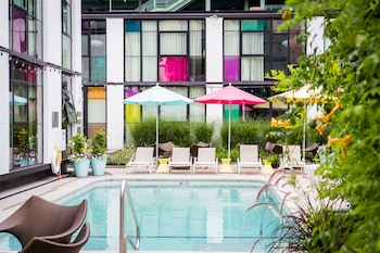 Outdoor pool, open 8:00 AM to 10:00 PM, pool umbrellas, sun loungers at The Verb Hotel