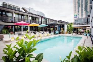 Outdoor pool, open 8:00 AM to 10:00 PM, pool umbrellas, pool loungers