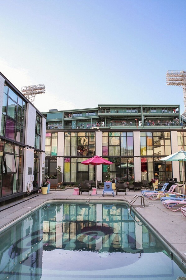 Outdoor pool, open 8:00 AM to 10:00 PM, pool umbrellas, pool loungers