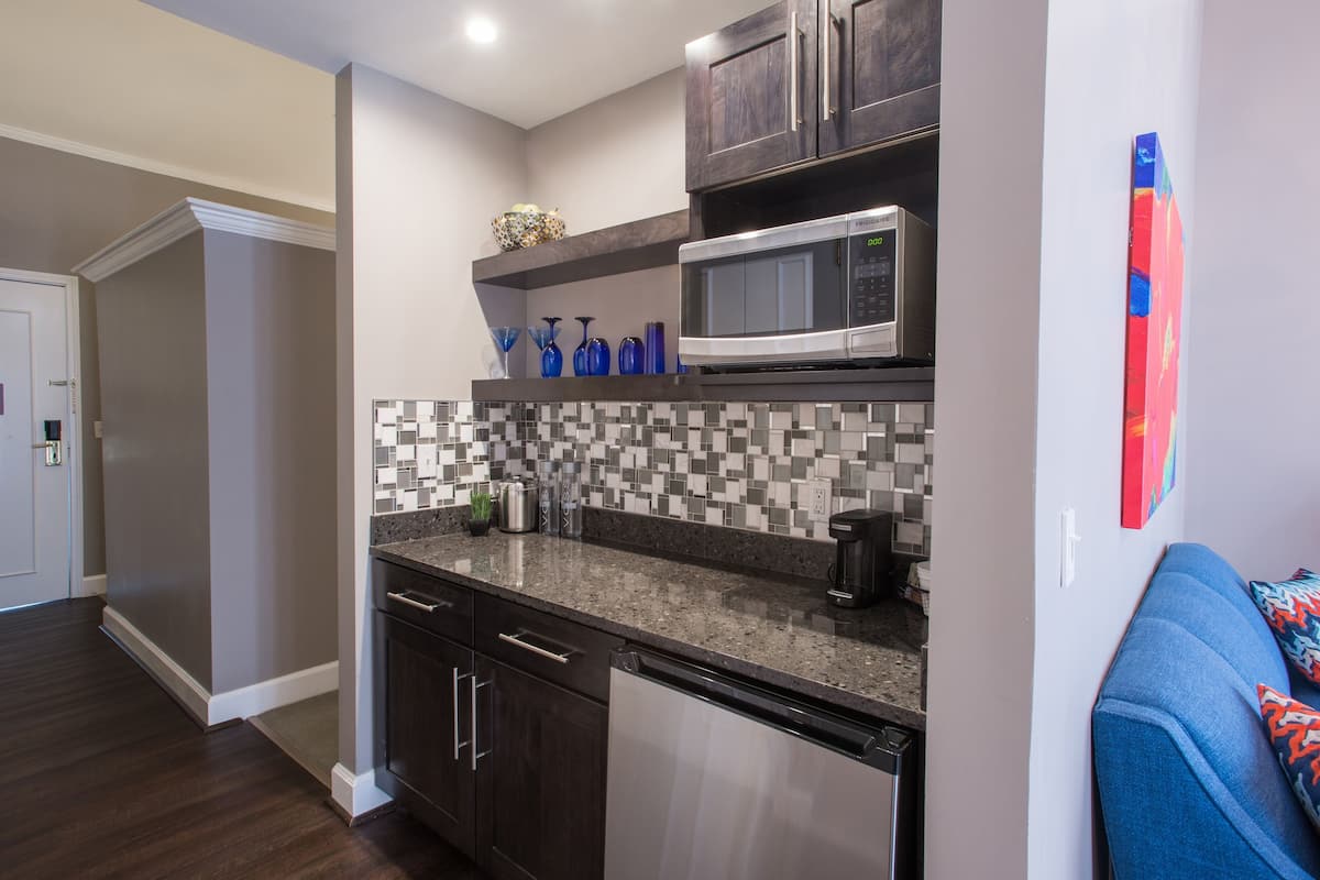 premier room, 1 king bed (flat) | private kitchenette | coffee/tea maker