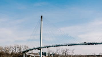 A large cable-stayed bridge with a central tower and multiple cables.