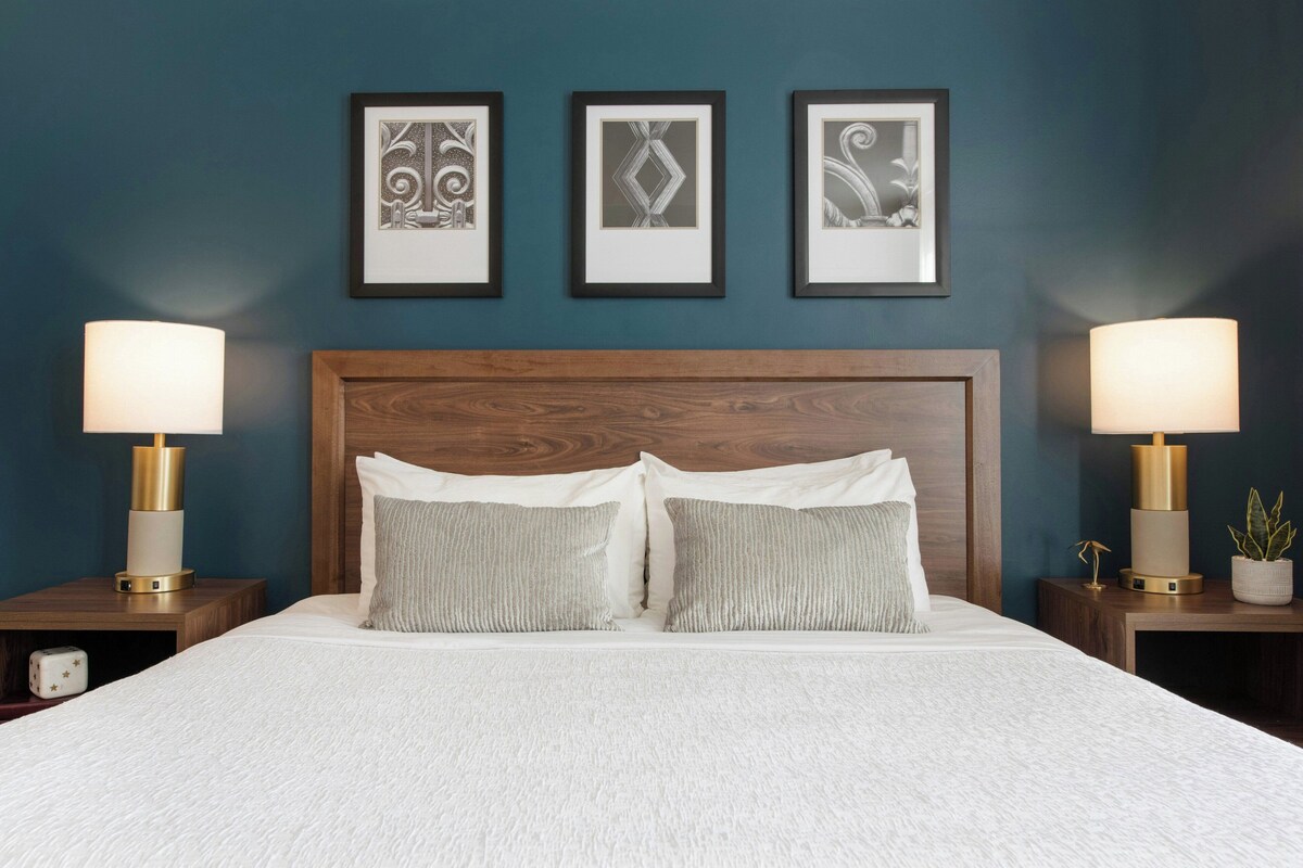 Premium bedding, laptop workspace, blackout drapes, iron/ironing board