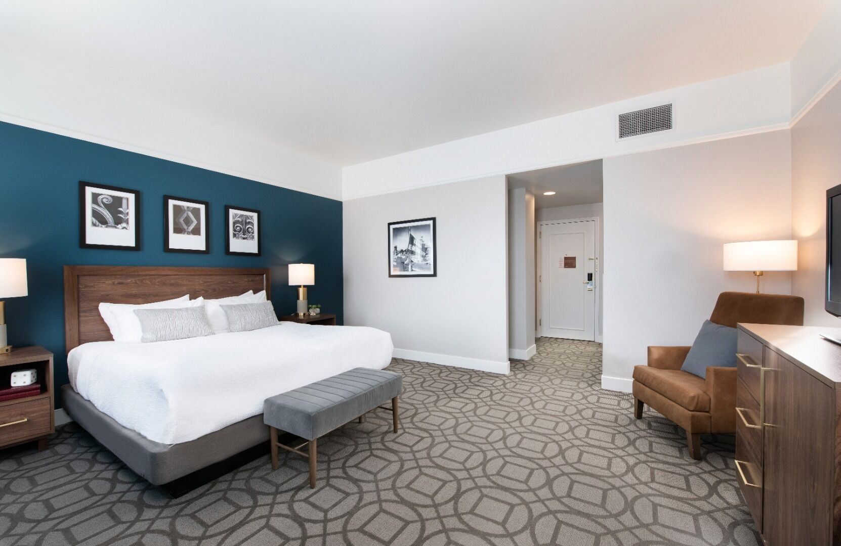 Premium bedding, laptop workspace, blackout drapes, iron/ironing board