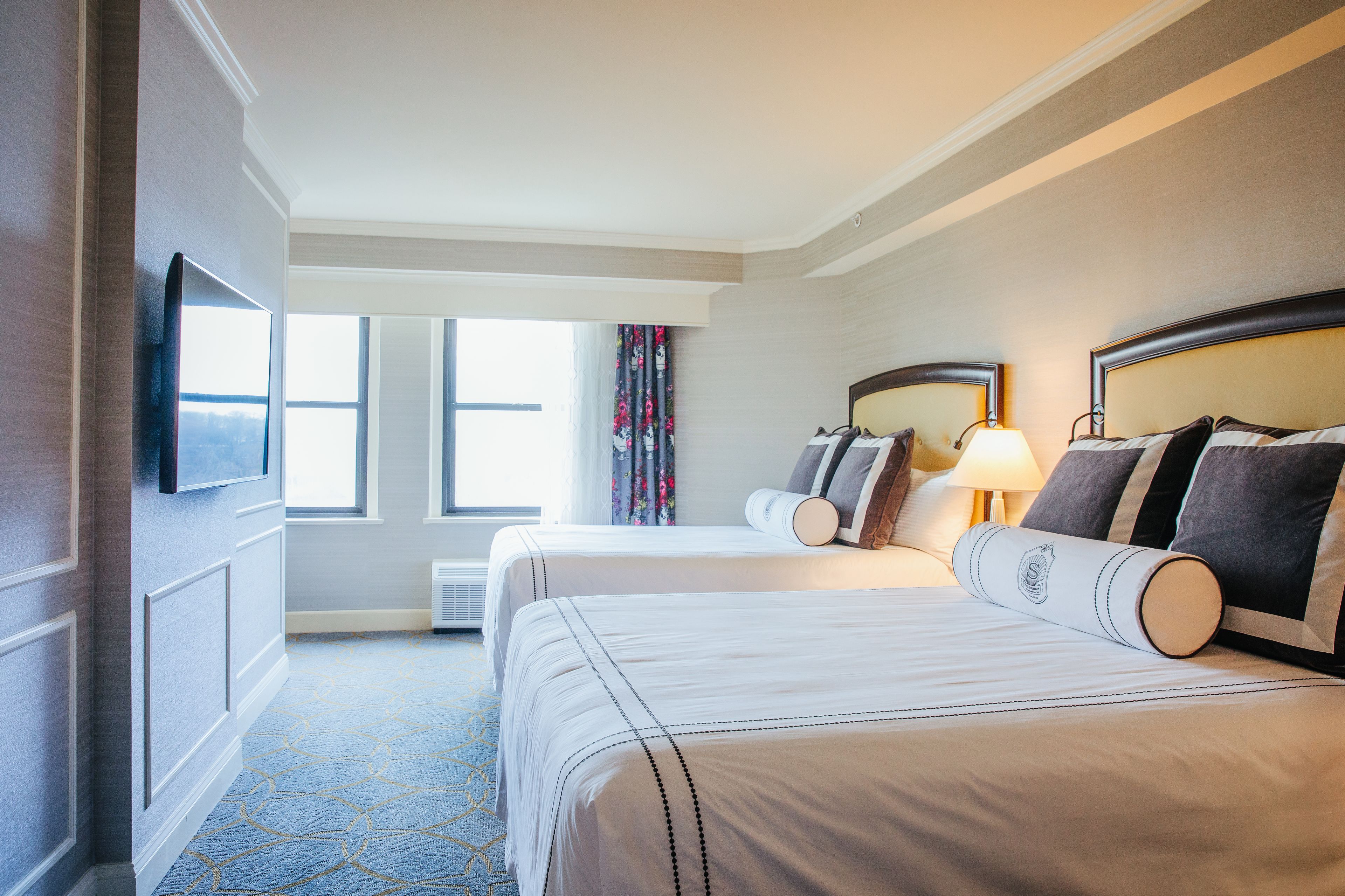 Premium bedding, down comforters, in-room safe, desk