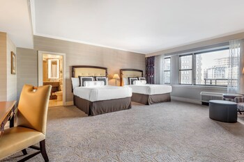 Premium bedding, down comforters, in-room safe, desk at Omni Shoreham Hotel