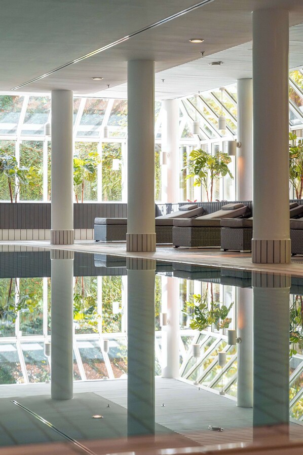 Indoor pool, open 6:30 AM to 10:30 PM, pool loungers