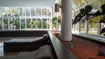 Indoor pool, open 6:30 AM to 10:30 PM, pool loungers