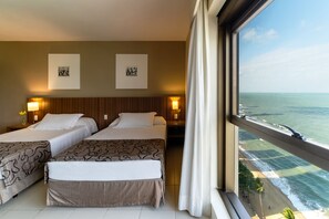 Premium Room, 2 Double Beds, Sea View | Minibar, in-room safe, blackout drapes, soundproofing