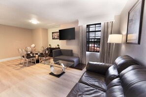 Premium bedding, laptop workspace, blackout drapes, iron/ironing board