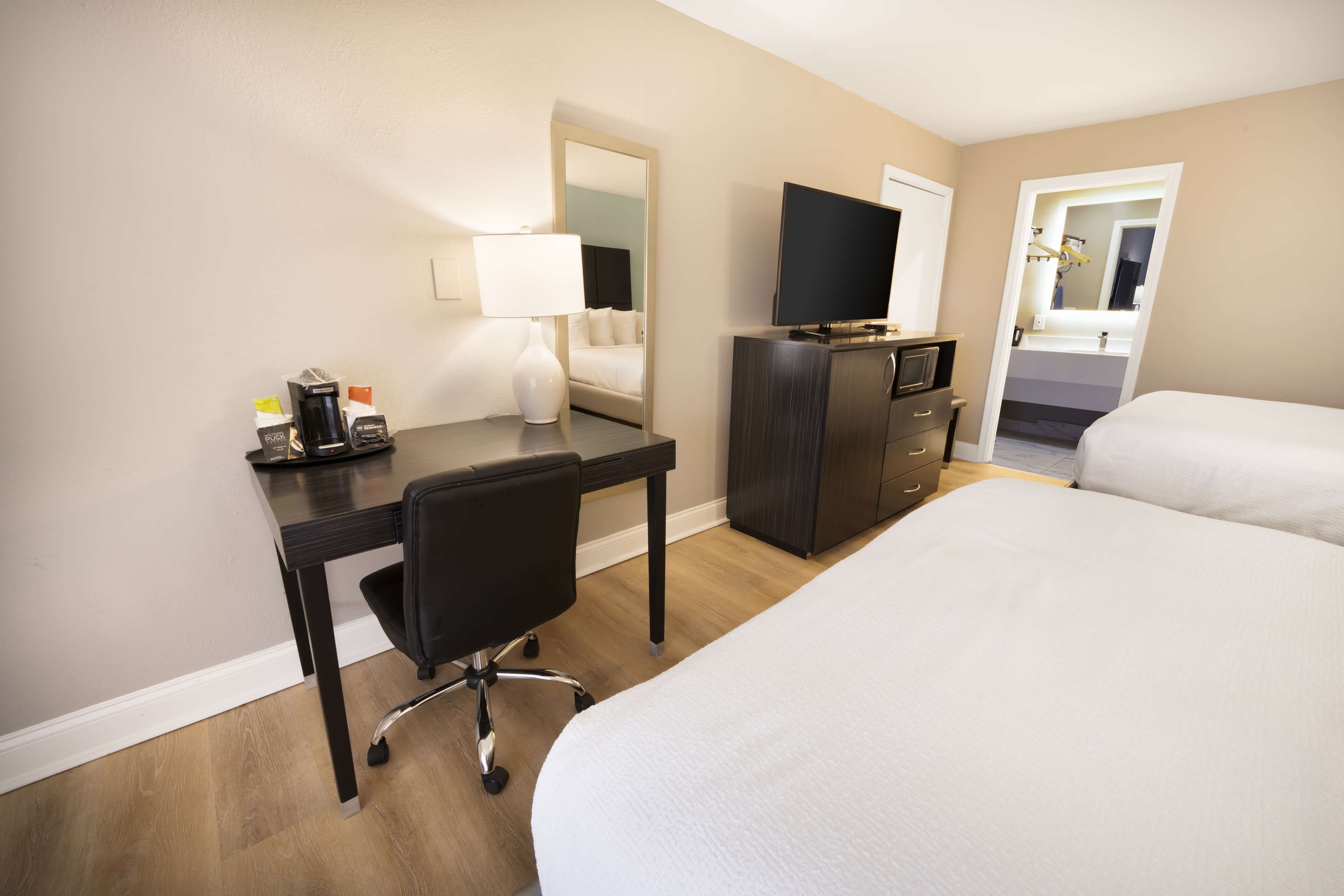 standard room, 2 queen beds, non smoking, refrigerator & microwave | premium bedding, laptop workspace, blackout curtains, iron/ironing board