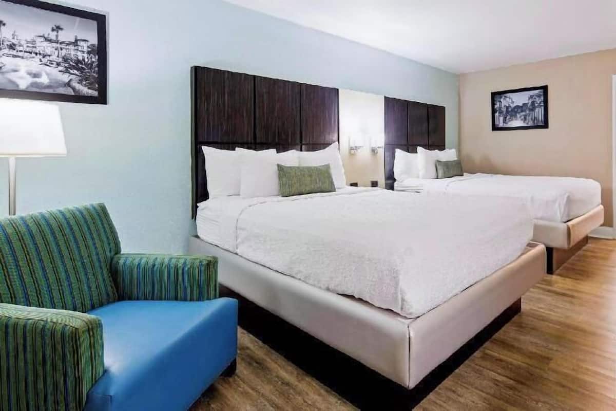 Premium bedding, laptop workspace, blackout curtains, iron/ironing board