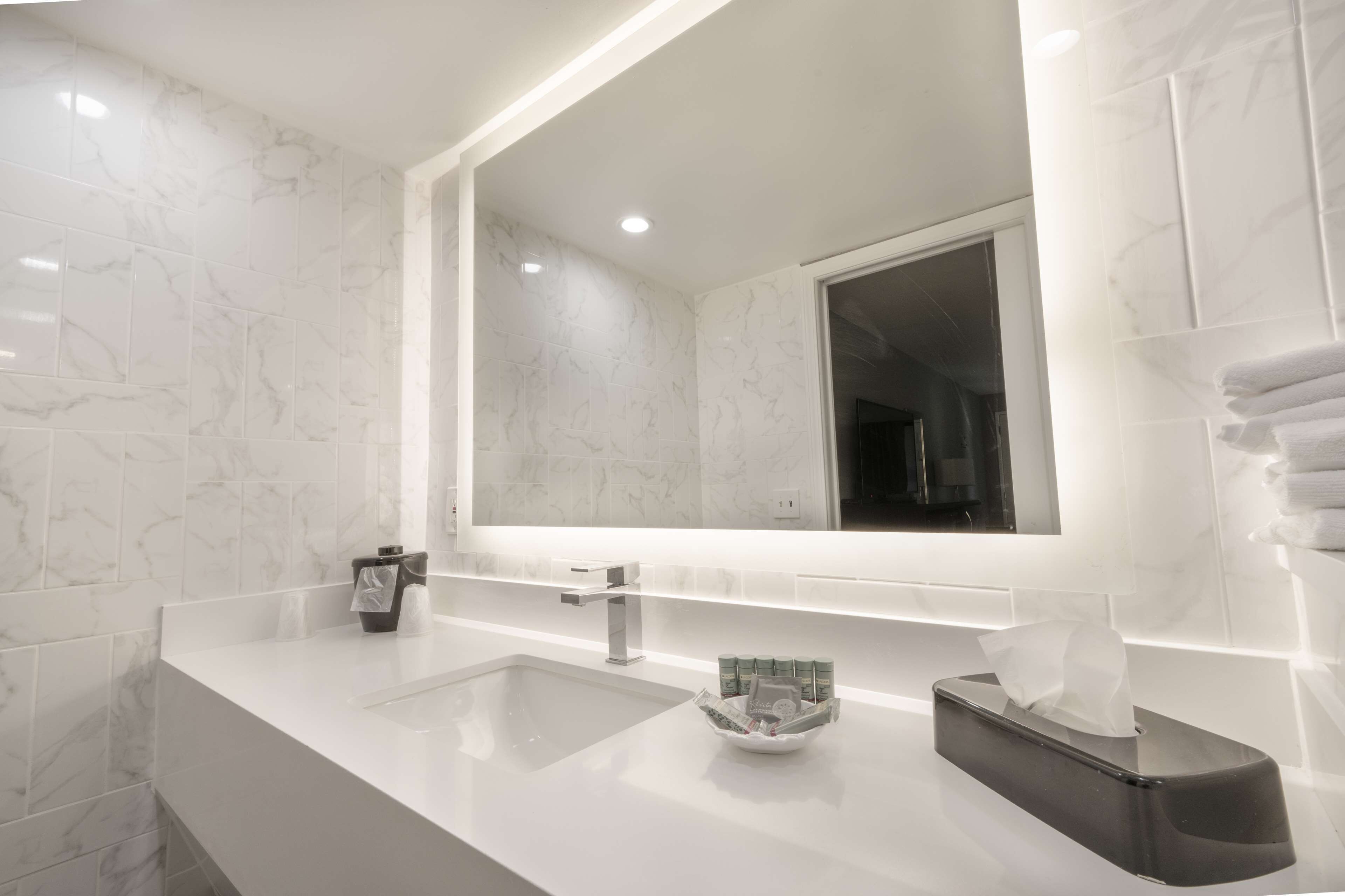 standard room, 2 queen beds, non smoking, refrigerator & microwave | bathroom | combined shower/bathtub, free toiletries, hair dryer, towels