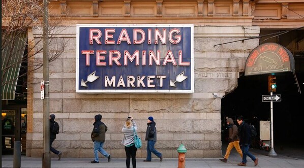 A building with a large sign reading "READING TERMINAL MARKET".