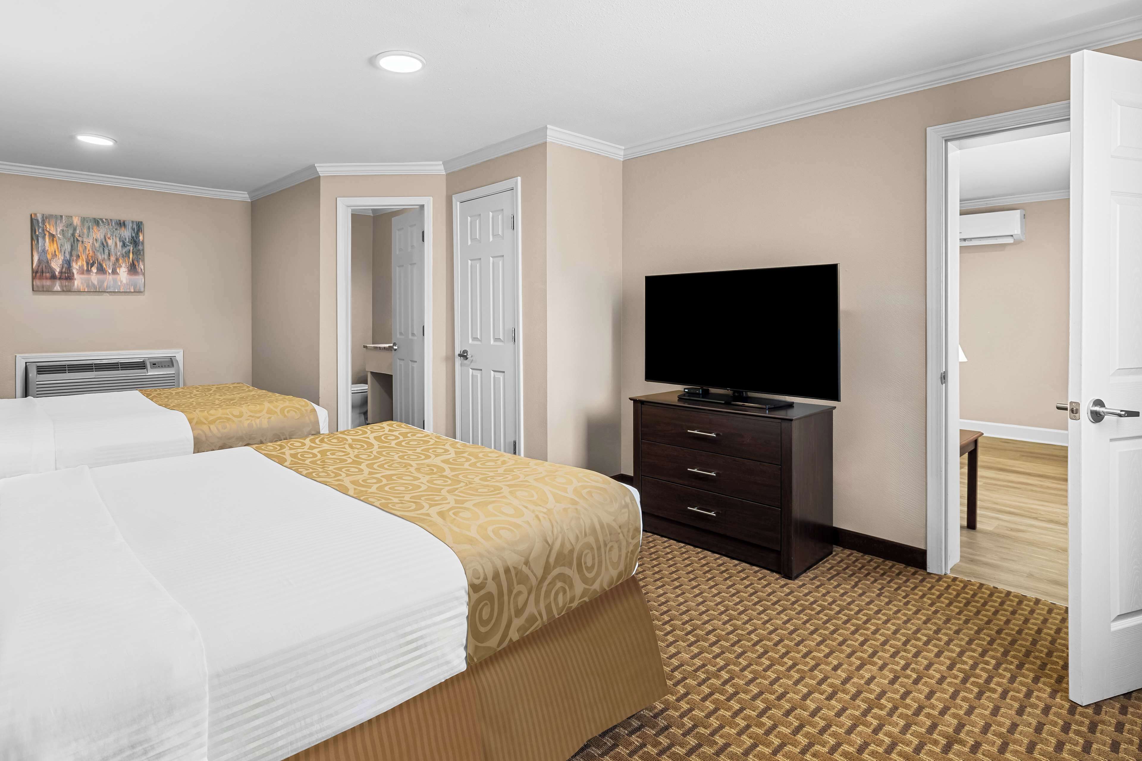 suite, 2 queen beds, non smoking, jetted tub | desk, laptop workspace, blackout curtains, iron/ironing board