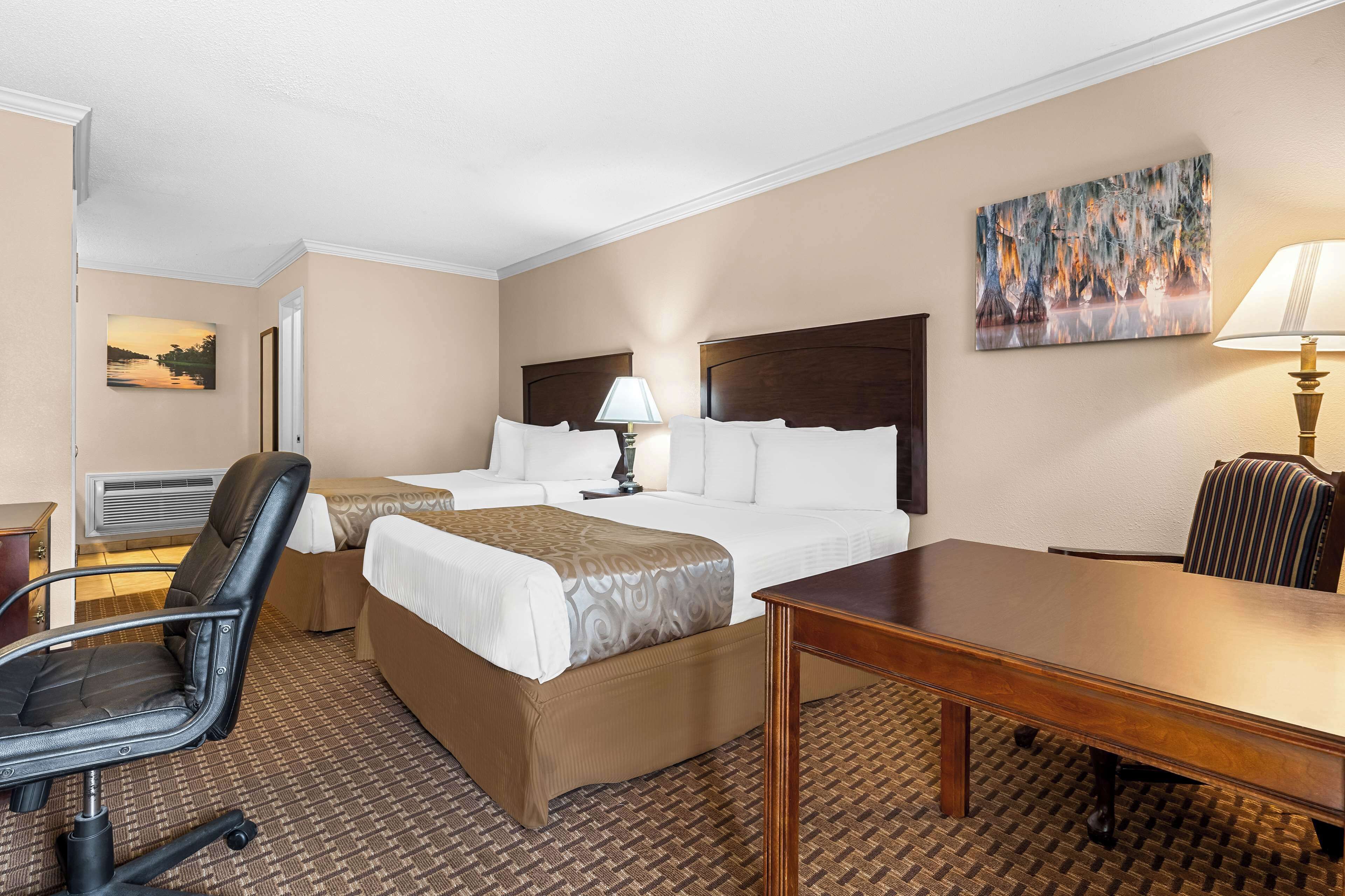 desk, laptop workspace, blackout curtains, iron/ironing board