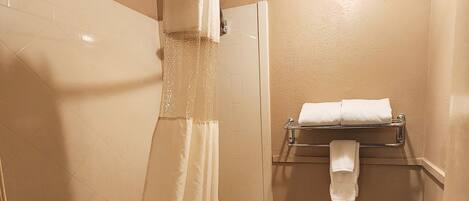 Bathtub, free toiletries, hair dryer, towels
