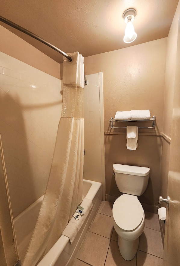 Bathtub, free toiletries, hair dryer, towels
