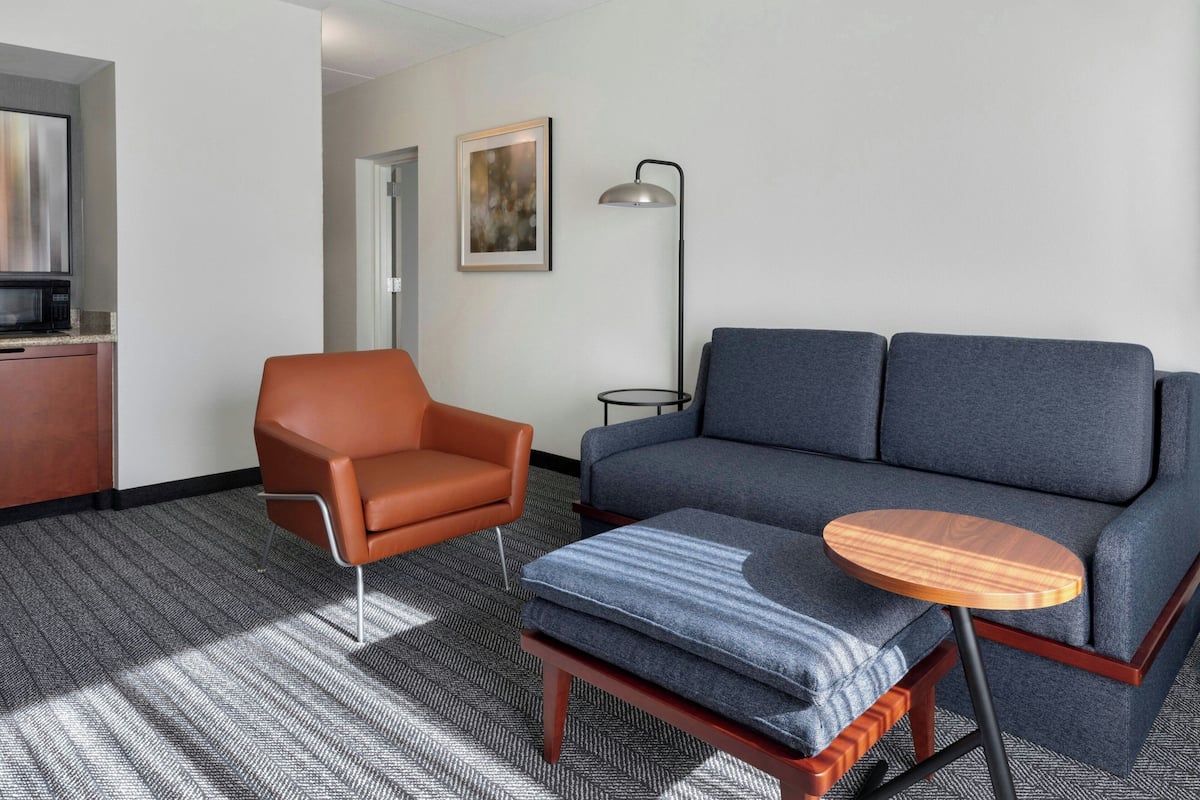 Suite, 1 Bedroom | Living area | TV