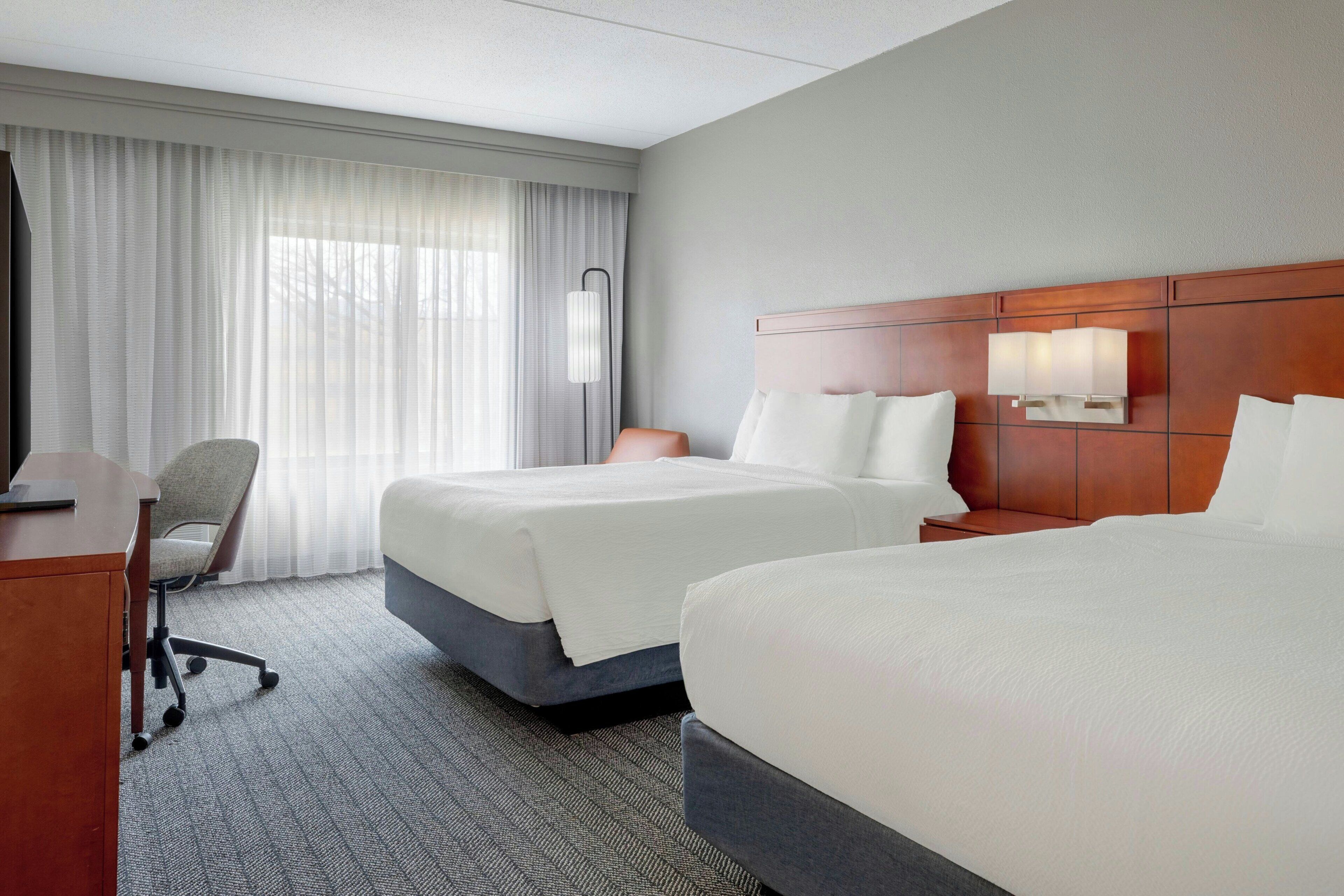 Room, 2 Queen Beds | Premium bedding, desk, iron/ironing board, free cribs/infant beds